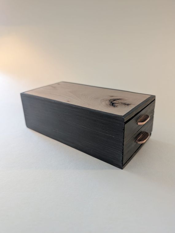 Box from ebonized oak, mystery wood, and copper handles