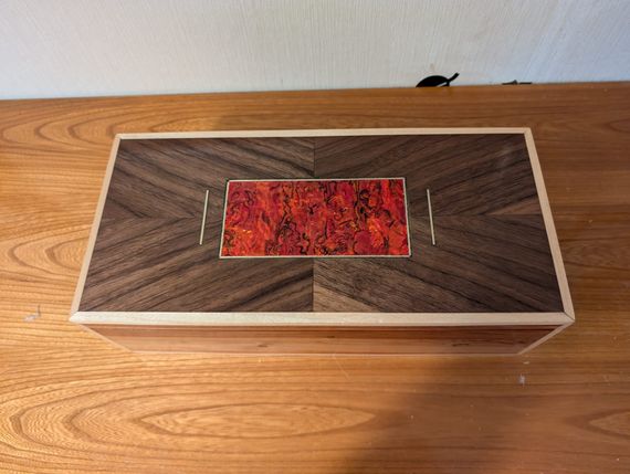 Box with walnut grain sunburst pattern and abalone inlay
